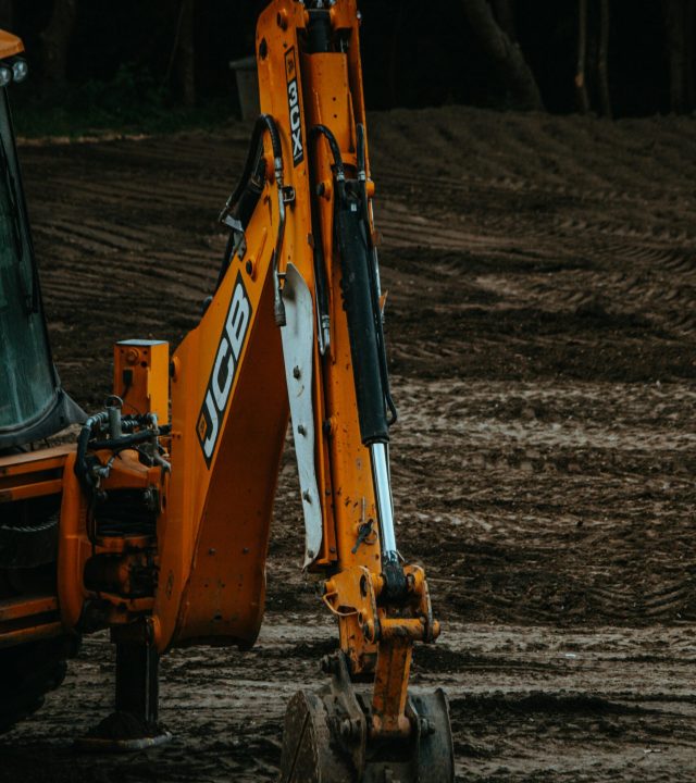 A powerful excavator digging on a construction site, perfect for industrial and construction themes.